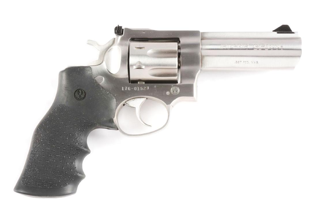 (M) Boxed Ruger Model GP100 Double Action Revolver.: Features six shot, fluted cylinder, stainless steel, full rib, full lug, adjustable sights, black composite grips. CONDITION: This Ruger displays a light drag line but appears as new, unfired. Comes i