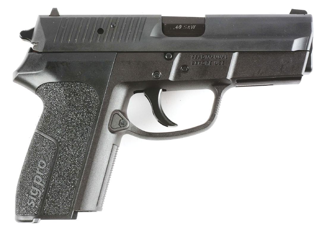 (M) Boxed Sig Arms SP 2340 Semi-Automatic Pistol.: Features white dot and line sights, top of slide is stamped "BLUE LINE", steel slide, alloy frame, double action and matte finish. CONDITION: This Model SP 2340 is in as new condition in original box 