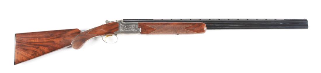 (M) Cased Browning Citori Grade III 20 Gauge Over-Under: Made in Japan, this Citori Model Grade III features a round knob grip that is checkered in two point pattern with long tang trigger guard. The buttstock is of nicely figured walnut and terminates with
