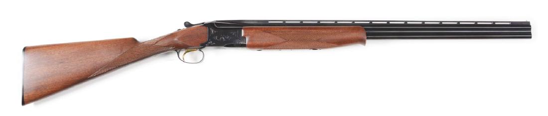 (M) Browning Citori Grade 1 Skeet 410ga Over-Under: 26" barrels with ventilated top rib and steel front bead. Chokes are marked Mod/Full. Straight gripped buttstock is checkered in two point pattern with 14-1/4" LOP over original Browning buttplate. Go