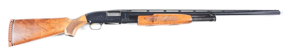 (M) Near New Ducks Unlimited Winchester Model 12 Slide: This is a basic modern Winchester Model 12 made in the USA. Features takedown, vent rib, double bead, blue finish, beautifully grained checkered walnut pistol grip stock with straight comb, Winchester