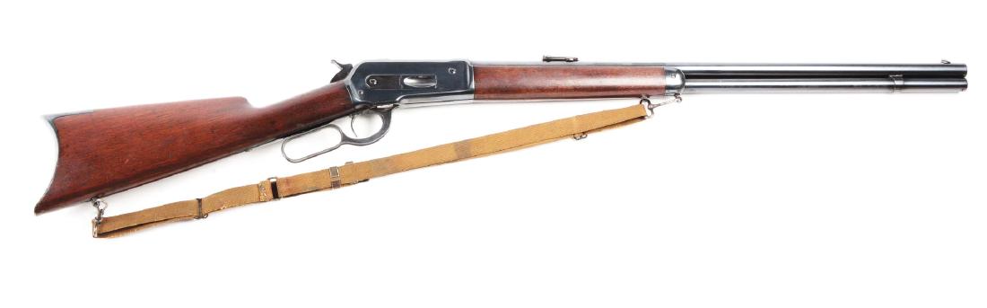 (A) Winchester Model 1886 .45-70 Lever Action Rifle: Features full round barrel, full magazine, folding ladder rear sight, standard front sight, blued finish, walnut stock, rifle butt, an old Winchester sling eyes with hooks, and a period canvas sling. 