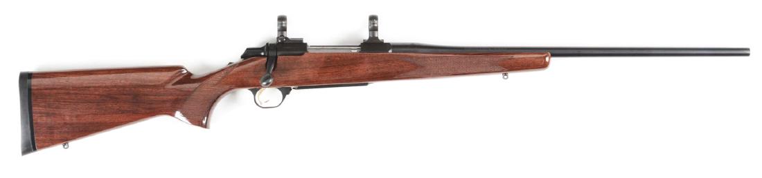 (M) Browning A-Bolt Bolt Action Rifle.: Browning A-Bolt bolt action rifle with checkered wood stock, recoil pad, detachable floorplate and sightless blued finish metal. Comes with two piece Leupold rings and bases. CONDITION: Like new with 