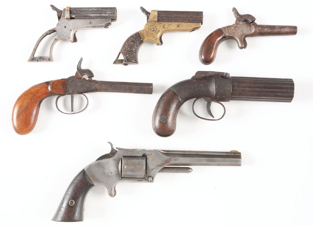 (A) Lot of 6: Antique Handguns.: Lot consists of: Guns (A) and (B) Two Sharps four barrel Deringers. CONDITION: Not working. Barrels rusted and grips missing. Guns (C) and (D) Two single boot pistols. Short barrel and long barrel. CO
