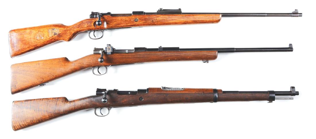 (C) Lot of 3: Mauser Action Bolt Action Rifles.: Lot consists of: Mauser bolt action military rifles. Two have cut down stocks, third is full military. Gun (A) BYF 44 Nazi marked Model 98. All visible matching numbers. Stock has been shortened, no h