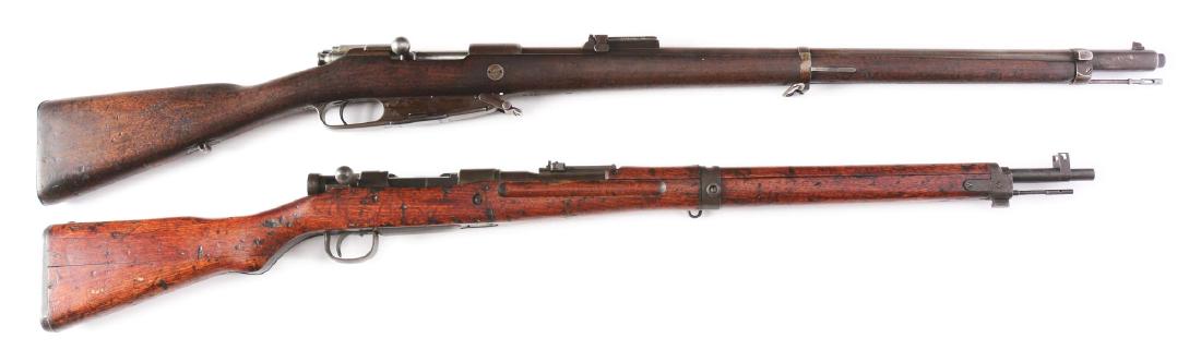 (C+A) Lot of 2: Foreign Military Bolt Action Rifles.: Lot consists of: Gun (A) German Gewehr 88 bolt action rifle made at the Spandau Arsenal. Receiver is dated but illegible. Full military wood stock with sling swivels. Military sights and original clea