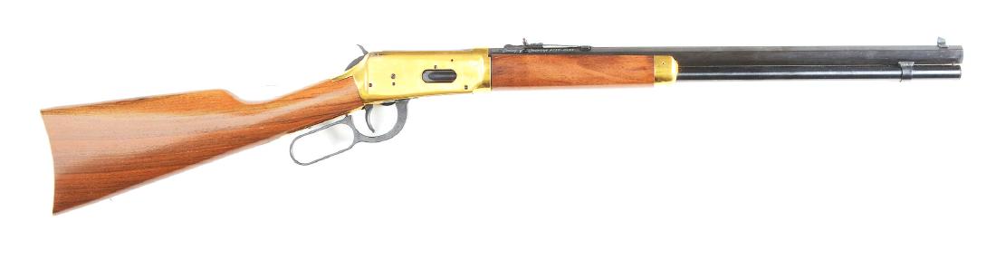 (C) Winchester 1966 Centennial Model 1894 Short Rifle.: In 1966 Winchester built a run of short and standard length octagon barrel rifles to commemorate the 100th anniversary of the Yellow Boy. Features full magazine, brass colored hardware to include fram