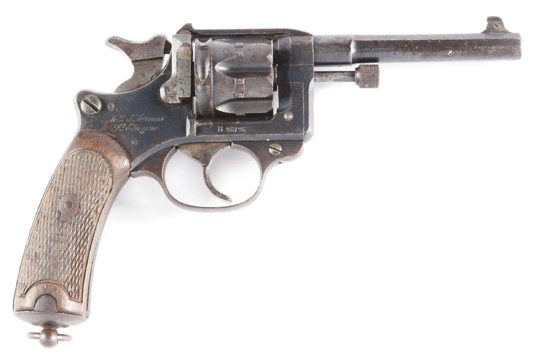 (C) French St. Etienne Model 1892 Double Action: Referred to as the French State Model 1892. Solid frame six shot revolver with double action and target front sight. CONDITION: No original finish left, retains blue-brown patina with pitting on barre
