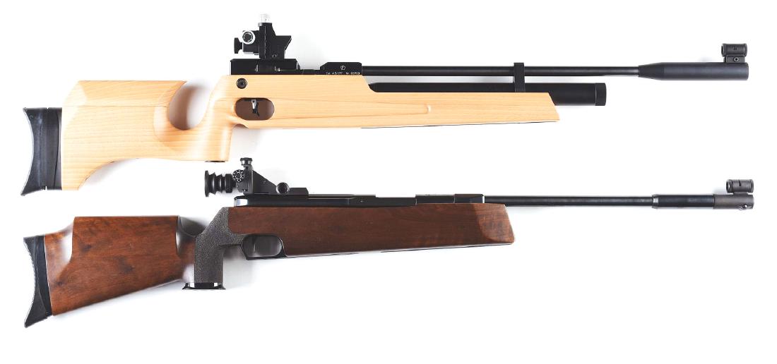 Lot of 2: NIB Hammerli AR-50 Air Rifle With Box and: Lot consists of: Gun (A) Hammerli AR-50 Swiss made competition air rifle with competition sights, charging adapter, adjustable butt and trigger and laminated hardwood stock. CONDITION: As new in box w