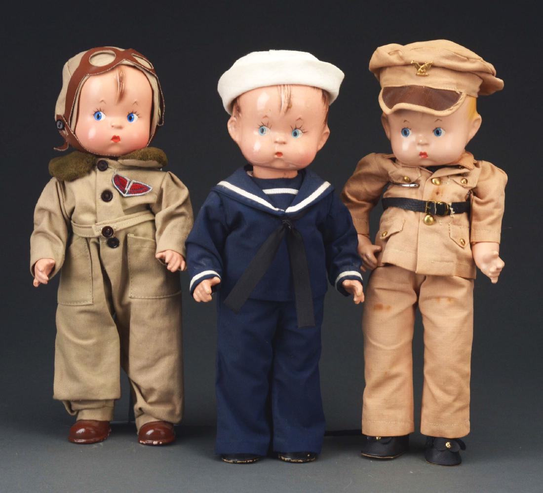 Lot of 3: Effanbee Skippy Dolls.: All 14" tall The first has a composition head with blue eyes, single stroke upper lashes, red nose dots, pouty mouth, excellent coloring, molded brown hair, soft cloth body of composition arms and leg