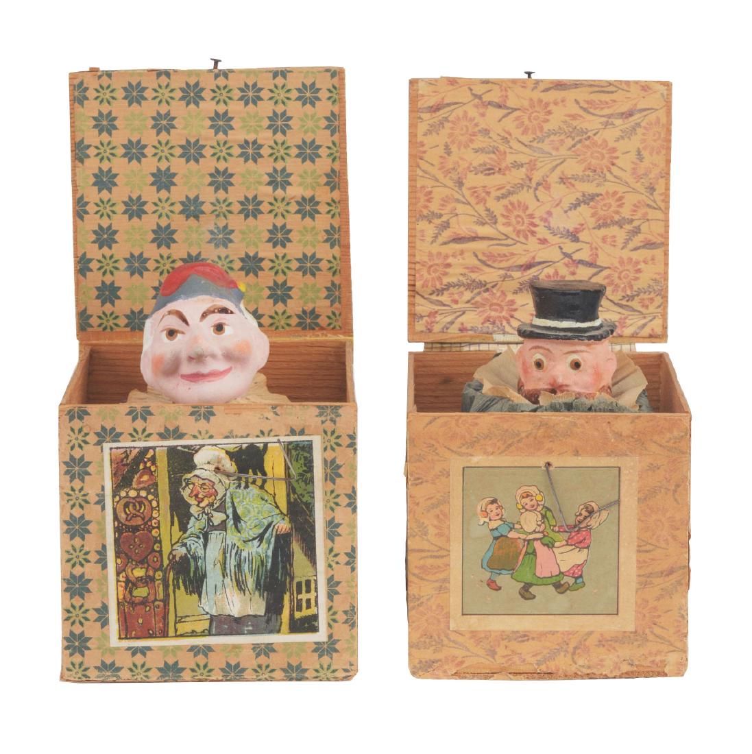 Lot Of 2: Jack-in-the-Boxes.: The first jack-in-the-box has a papier mache head of a man with a mustache, wooden box. No paint loss or damage. The second jack-in-the-box has a composition head of a clown with a mustache, wooden bo