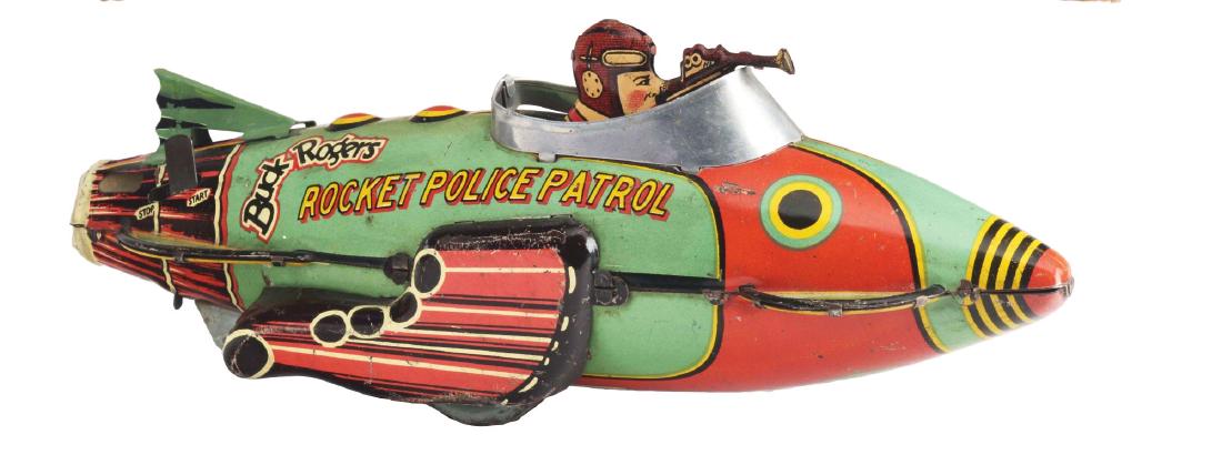 Marx Tin Litho Wind Up Buck Rogers Rocket Police: This is the version with Buck Rogers holding gun in cockpit. Some scuffing on the bottom, as per usual with this toy. Needs flint to spark and has a replaced tail fin. Some scratching and wear overall