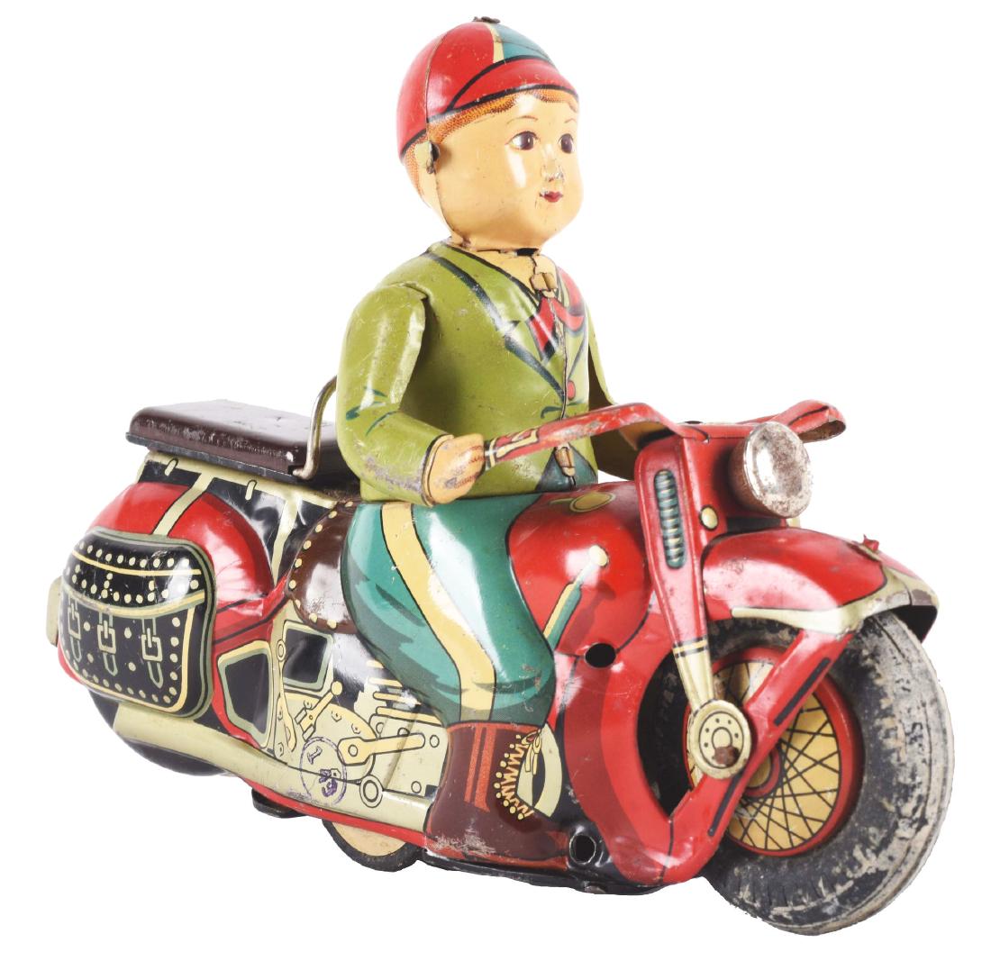 Japanese Tin Litho General Motorcycle.: Friction driven motorcycle; friction is slightly slipping. Marked "General" on one side of gas tank. One front fender rod is replaced, the other has some pitting, some scratching and wear.Condition: (