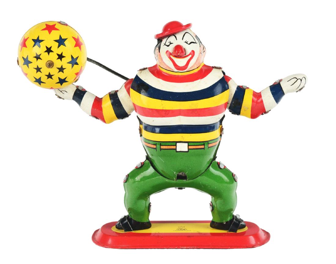 Tin Litho Wind Up Bobo The Juggling Clown. (1 of 2)