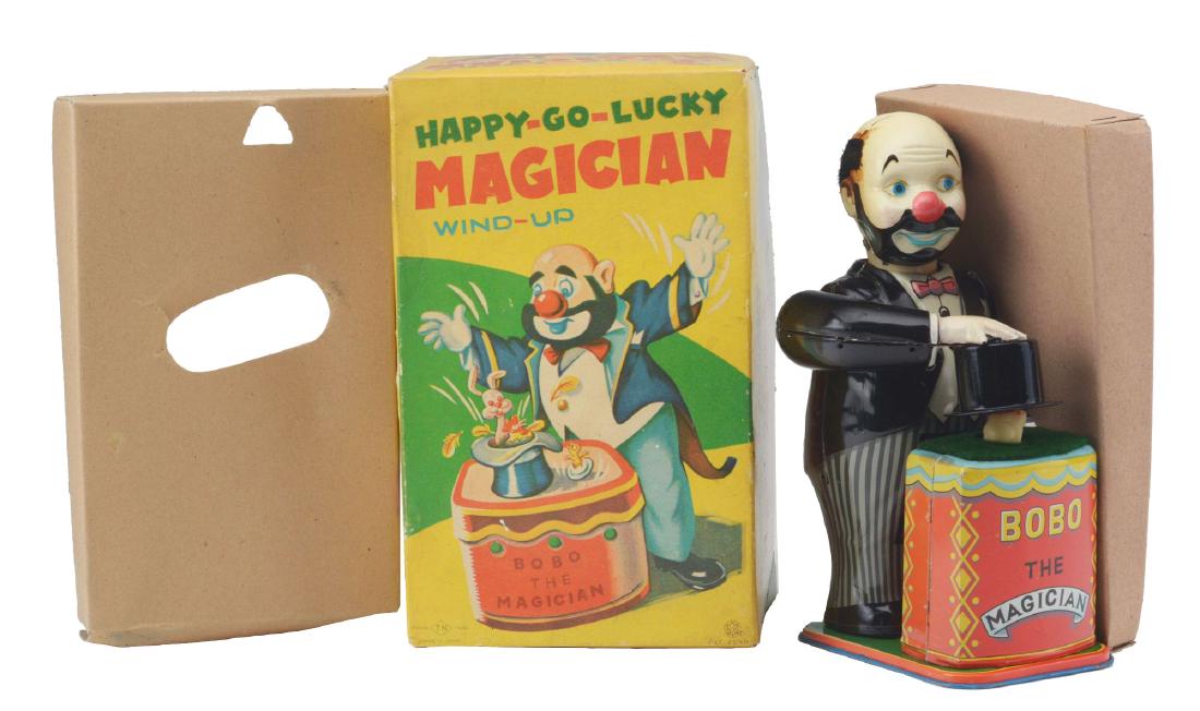 Tin Litho Wind Up Happy Go Lucky Magician. (1 of 9)