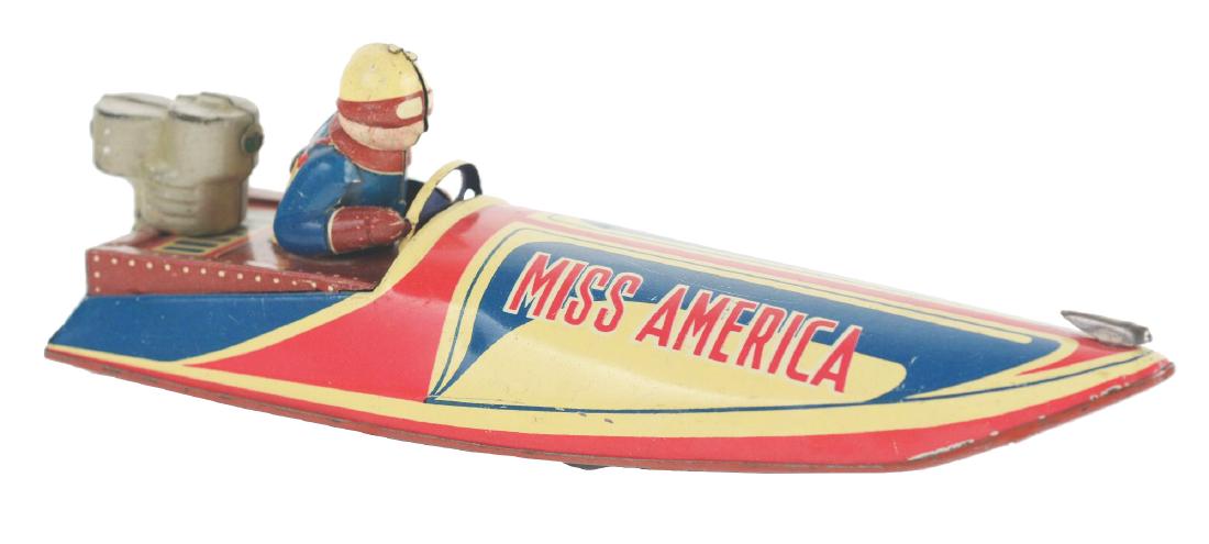 Tin Litho Wind Up Miss America Speed Boat.: Japan. Harder to find speed boat, works with nice action. When wound it emits motor sound as it moves forward; the rear wheel attached to mechanism that moves to change direction of the boat. Near min