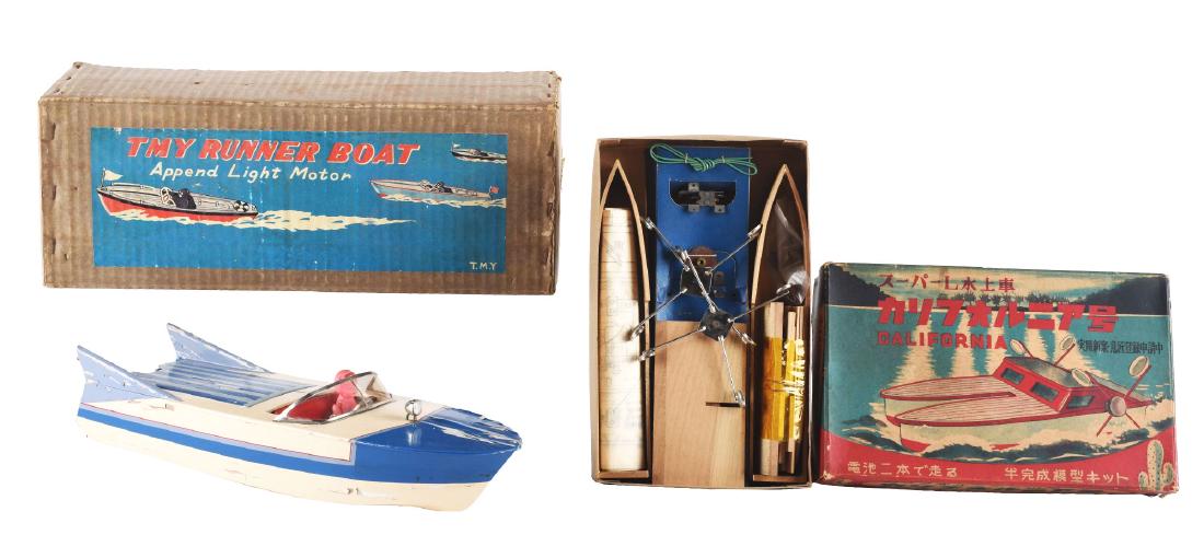 Lot of 2: Battery Operated TMY and Japanese Wooden: The first is a wooden TMY Runner Boat, Japan, TMY. Scarce boat with celluloid driver, one running light and two tail lights, made to be fitted with an outboard motor, working, some flaking throughout,