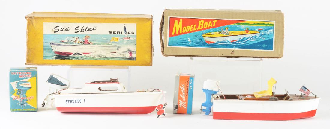 Lot of 2: Wooden Battery Operated Japanese Boats with: The first is a Sunshine Series Structo I Boat with Lang Craft Outboard Motor, Japan, Bandai. The bottom of the boat is plastic, the rest is wood, marked "Structo I" on the sides, original Bandai tag, 