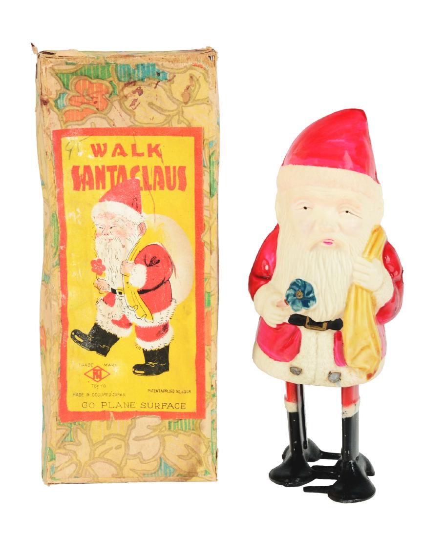 Tin, Celluloid and Lead Walking Santa Claus. (1 of 6)