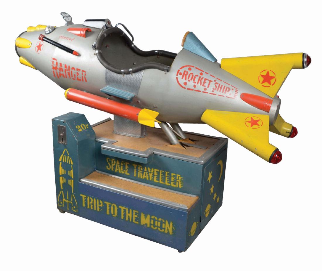 Coin-Op Sky Ranger Kiddie Ride Arcade Machine.: An exciting children's amusement ride in the shape of a rocket ship with missiles on either side, a large headlight, and three red taillights. Each rider can use the steps to climb into the cockpit an