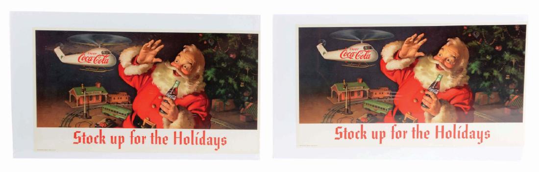 Lot Of 2: Coca-Cola Stock Up For The Holidays Posters.: Lot consists of two new old stock posters that have never been used. They are both shrink wrapped onto foam board. They are in near mint condition with no issues. Condition: (Near Mint). Dimensions: E