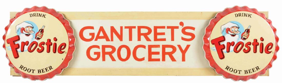 Gantret's Grocery Tin Sign With Frostie Root Beer: This is a neat country store sign with two Frostie Root Beer bottle cap signs mounted on either side. Both Frostie signs have some soiling, light wear and some light paint splatter on the top border a