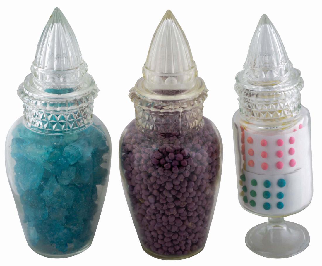 Lot Of 3: Candy Jars.: Lot consists of 1- 2 identical 12" tall candy jars with pointed lids. One of the jars appear to be more yellowed than the other.; 1 - 11-1/4" tall candy jar with pointed lid, straight cylindrical side