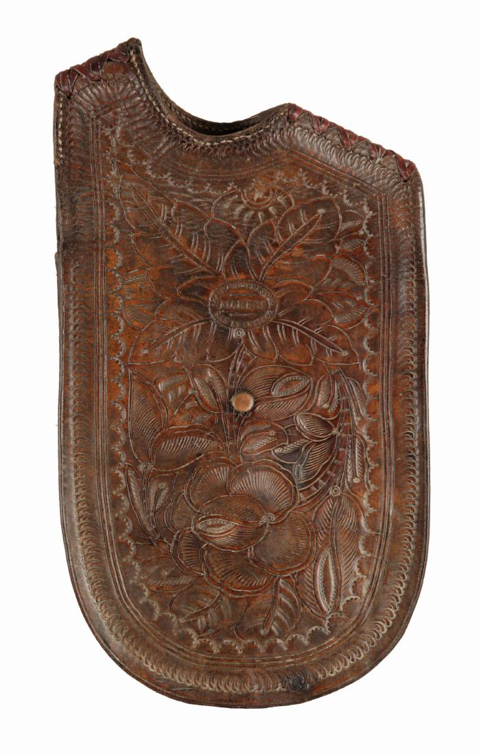 Main and Winchester Pommel Bags.: Highly collected pair of light colored pommel bags with finely tooled flaps, single action holster and finished off by the Holy Grail of maker marks. Condition: (Very Good).Dimensions: