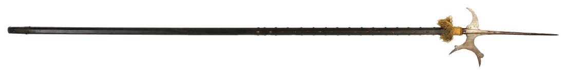 17th Century Pierced Blade Halberd, Possibly Italian.: Blade measures 6 - 3/4", central spike measures 14", fluke 3 - 1/4". Blade and fluke well pierced with hole decoration. No marks. Well forged. Old lead seal collection tag attached. CONDITION: Overall