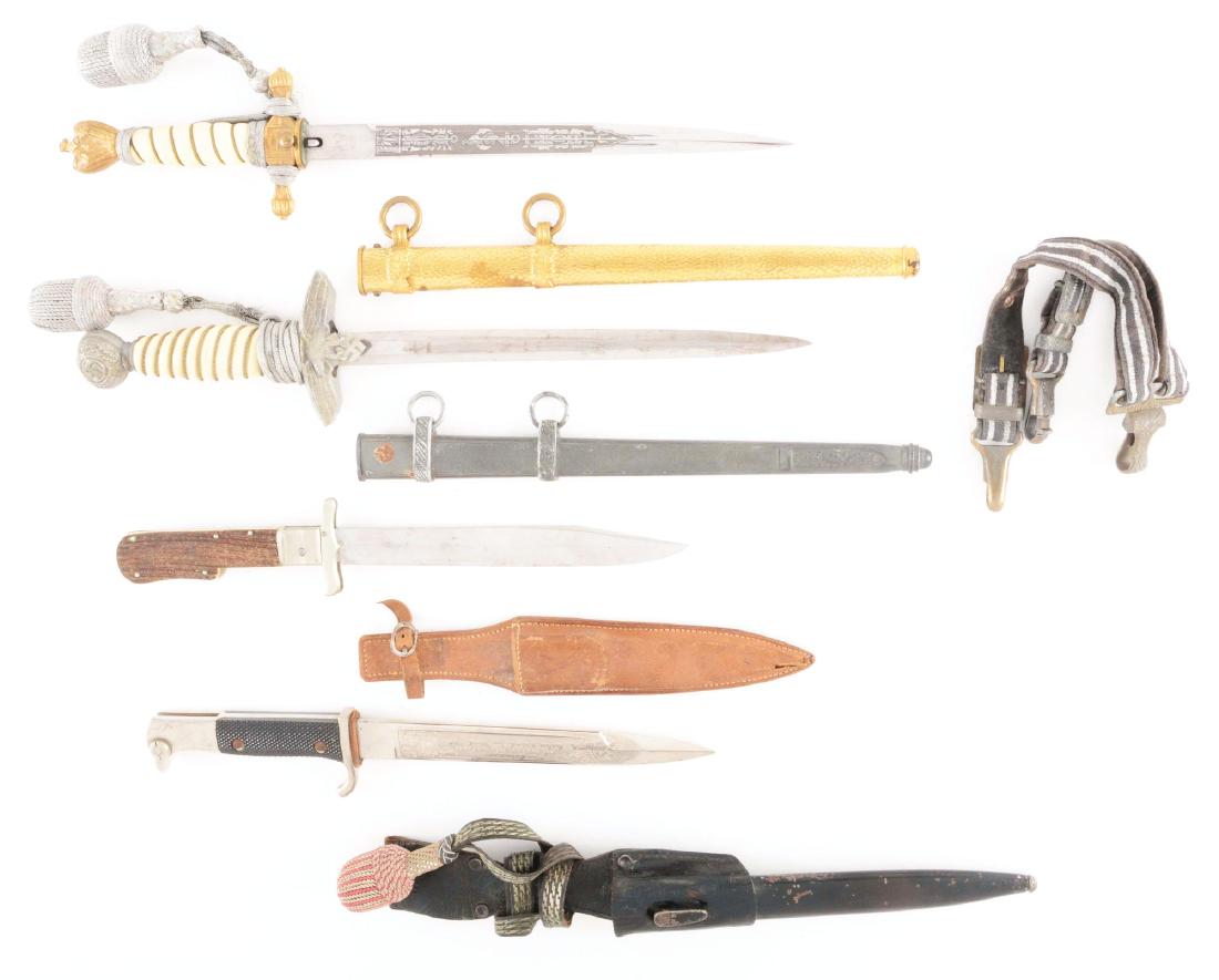 LOT OF 4: THIRD REICH HEER AND KRIEGSMARINE DAGGERS,: Lot contains (A) Luftwaffe dagger, (B) Kriegsmarine double-etched dagger, (C) Folding knife, and (D) Etched dress bayonet. (A) Luftwaffe dagger with a nickel plated unmarked blade with light scattered