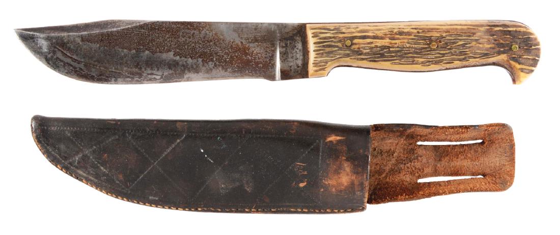 WILL & FINCK CALIFORNIA HUNTER.: California style hunting knife with upswept blade marked on ricasso with bullseye and WILL & FINCK, S.F. CAL. Elk antler handle scales, jigged to enhance texture, with brass pins. Original leather she