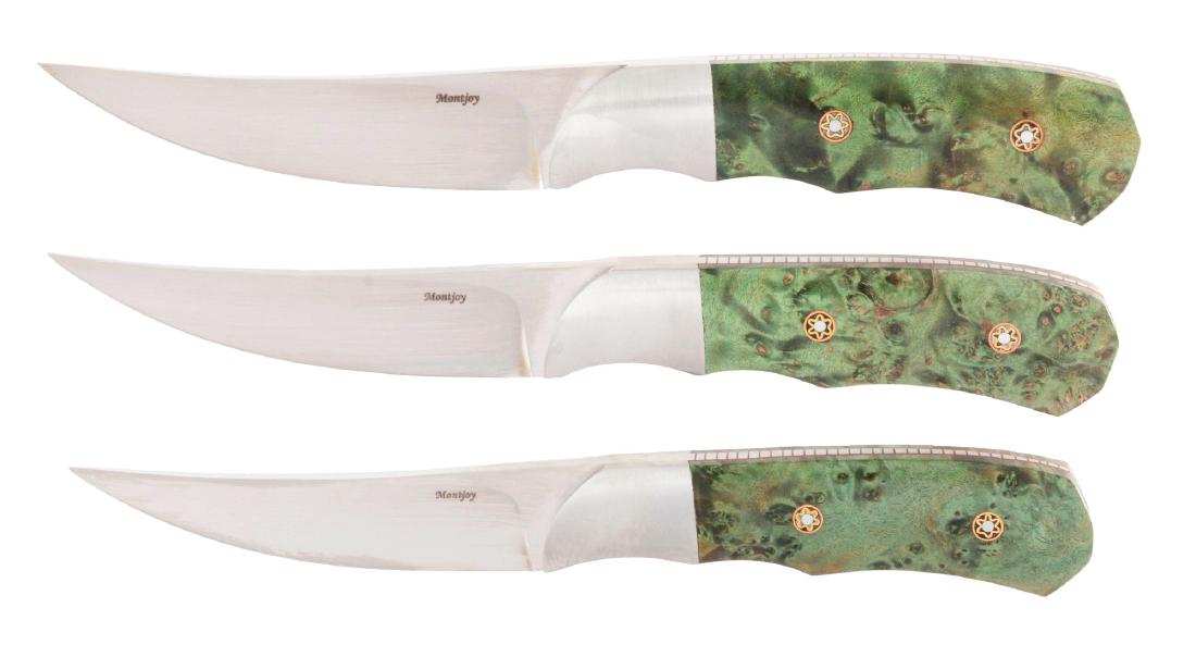 LOT OF 3: MATCHING CLAUDE MONTJOY CUSTOM SKINNING: Lot consists of: (A) The first of three matching knives, this narrow-bladed trailing point skinner shows its original edge, stylized "Montjoy" etch and hand rubbed finish on the blade and bolsters. Th