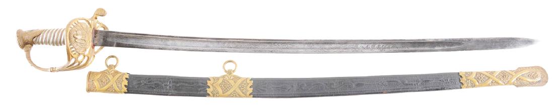 An Extremely Unusual, Possibly Unique, Civil War: The 30 - 1/2" fullered blade, etched right side with large "U.S", trophies of arms, etched on left with a Civil War battle scene featuring Union troops overcoming Confederate soldiers. The brass hilt,