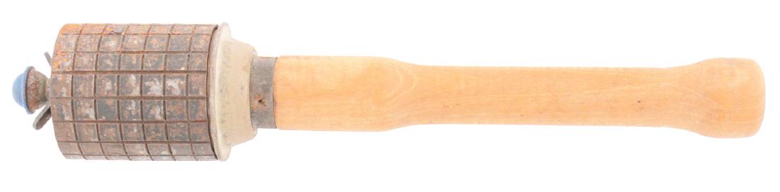 Exceptional Example of World War II German Stick: Developed during World War II to replace the Stielhandgranate 24, the German Stielhandgranate 43 simplified the manufacturing process by using the BZE fuze from the egg grenade and placing the fuzing