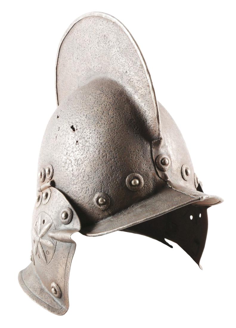 A 17th Century Burgonet In The Form of a Sturmhalbe,: Helmet shows great age and is pitted overall with a few minor holes in the skull. Plume holder appears to be the original. Ear flaps skillfully forged but appear to be later than the skull itself. Hel