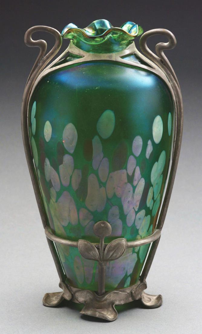 Loetz Vase with Van Hauten Pewter Mount.: Loetz vase in the Phaenomen 1/473 genre has large iridescent oil spot decoration against an emerald green background. The oil spots show strong purple and platinum highlights. Unsigned. The vase is ho