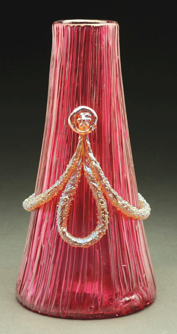 Loetz Pink Empire Vase.: Loetz vase in the Empire decor has vertically textured pink body decorated with applied gold iridescent garland. Unsigned. Very good to excellent condition. Condition: Dimensions: 8 - 1/4" x 4".