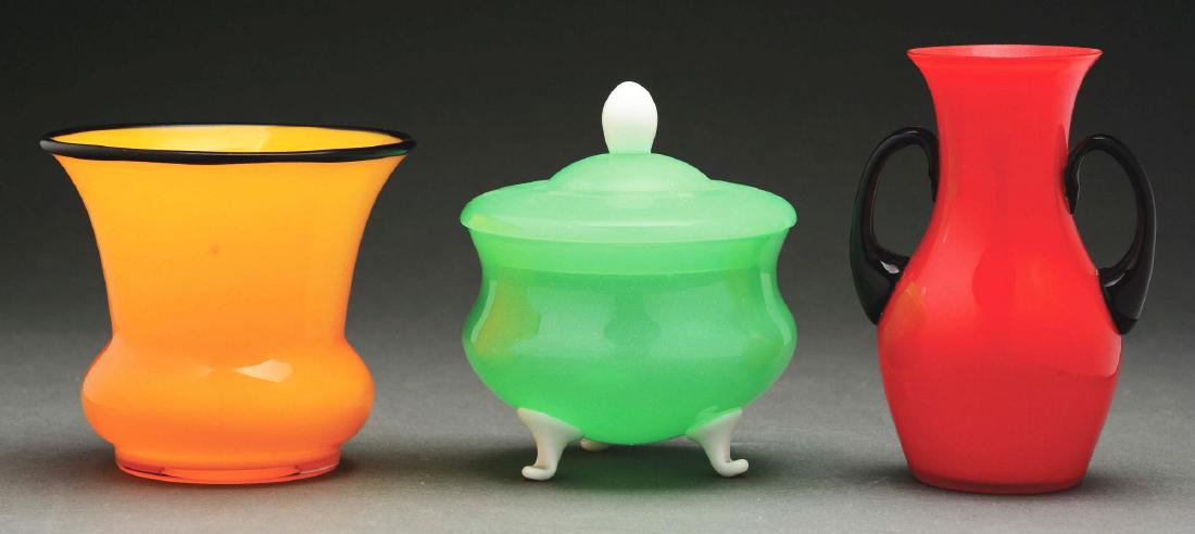 Three Loetz Art Deco Items.: First, Loetz Art Deco vase has red body and two applied black glass handles, unsigned; second, Loetz Tango vase has orange body shading to yellow and is finished with applied black lip, unsigned; thir