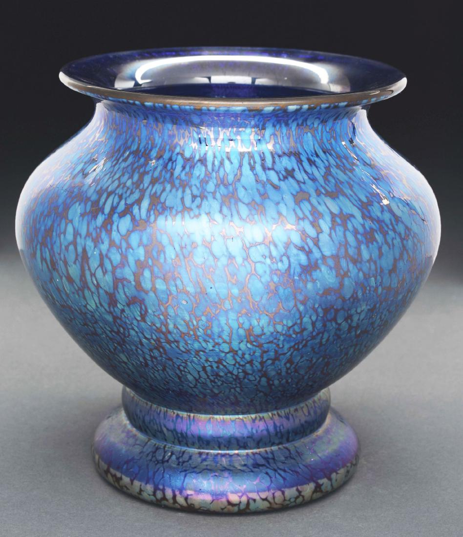 Loetz Papillon Vase.: Loetz vase in the Papillon genre has blue iridescent Papillon design covering the exterior of the vase, all against a cobalt blue background. Vase is signed in the polished pontil "CZECHO-SLOVAKIA" wi