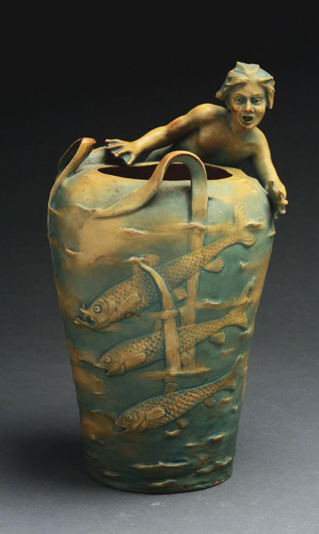 Bernard Bloch Austrian Merman Vase With Fish.: Bernard Bloch Austrian Ceramic Vase in matte green glaze with a merman swimming with a school of fish. Circa 1900, with excellent form and patina. Incised with artist signature on vase, "SCHWARZ". Bas