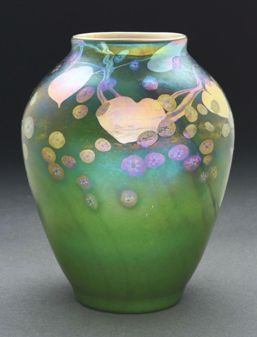 Tiffany Favrile Millefiori Vase.: Tiffany Favrile vase has round, shouldered body with green exterior and iridescent gold interior. Exterior is decorated with iridescent platinum leaf and vines among small millefiori cane flowers rand