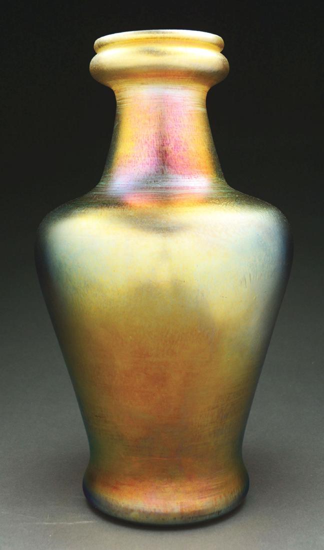 Tiffany Favrile Vase.: Large Tiffany gold Favrile vase has flaring body with square shoulder and flaring rounded lip, finished in rich gold iridescence with flashes of pink, and red. signed on the underside "L. C. TIFFANY-F