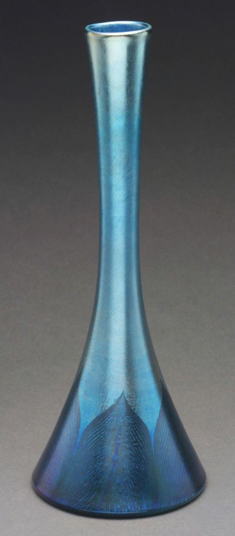 Tiffany Pulled-Feather Vase.: Tiffany Favrile vase has round tapered body with five dark blue pulled-feathers rising from the foot against an iridescent light blue background. Signed on the underside "x137 1116-7912 K L. C. TIFFAN