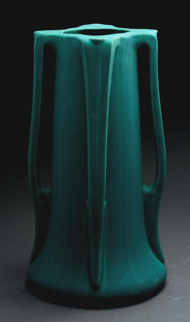 Large Arts & Crafts Matte Green Buttress Vase.: Large Arts and Crafts Matte Green Buttress Vase with four handles in the style of Teco. Circa 1910. Unmarked, and possibly by Owens Pottery. There are a few touch marks present around the base, but no