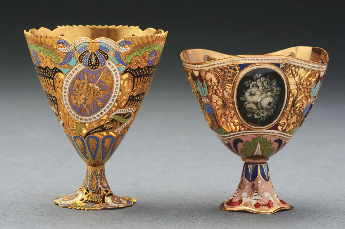 Set of 2: Enamel Ware Zarf's: Lot consists of: 2" tall open pierced work egg cup with a 1-3/4" diameter top, and a 2" tall fine pierced work egg cup. No losses to the enamel or damage to either piece.Paperwork: Condition: (Excelle