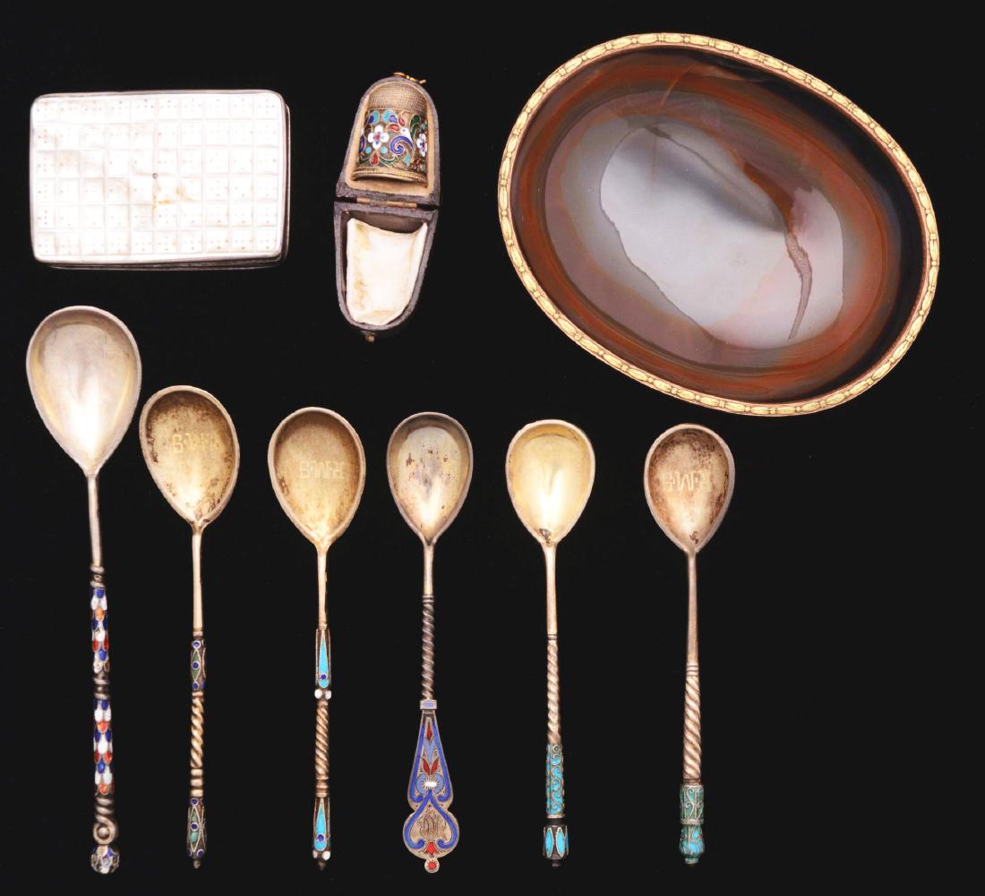 Set of 9: Russian Enamel Demitasse Spoons, with: Three of the six spoons are marked "R.M.S." on the bowls. Five spoons are 4" long, and one is 5-1/4" long. They have no enamel loss. The thimble is in the original case. The mother of pearl hinged and