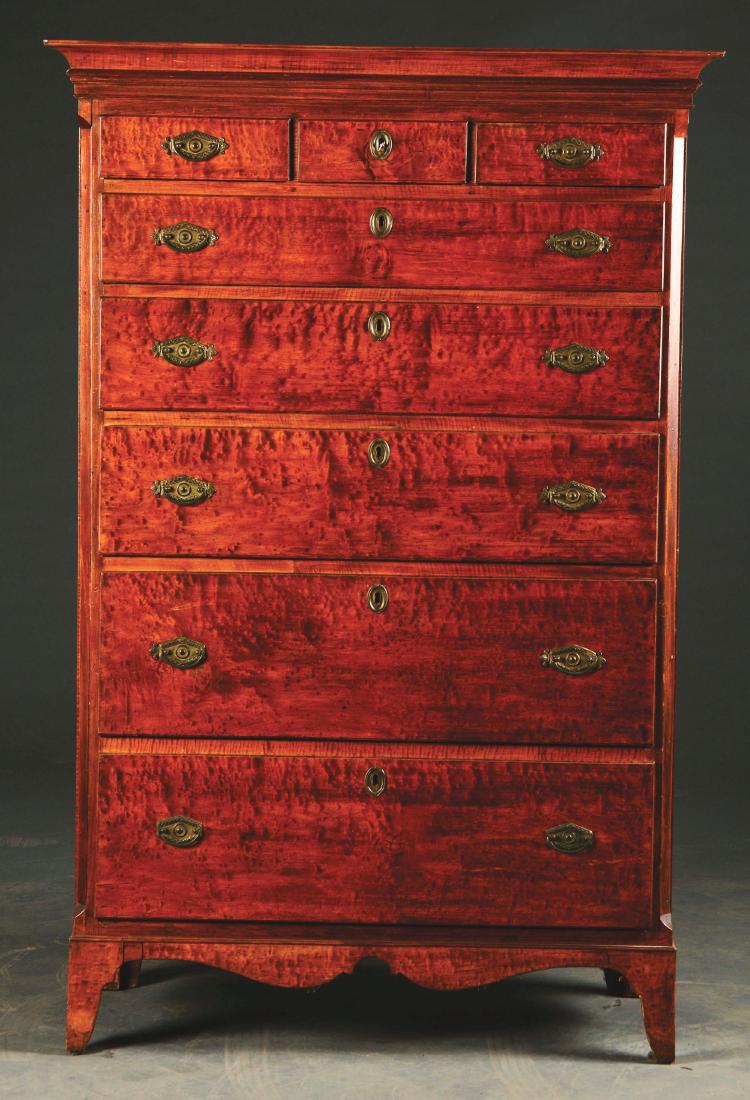 Fine Federal Tiger Maple Tall Chest.: Late 18th to early 19th century. New England. The rectangular dovetailed case with cove-molded cornice over three aligned short drawers, above five graduated long drawers, all with molded edges. It is