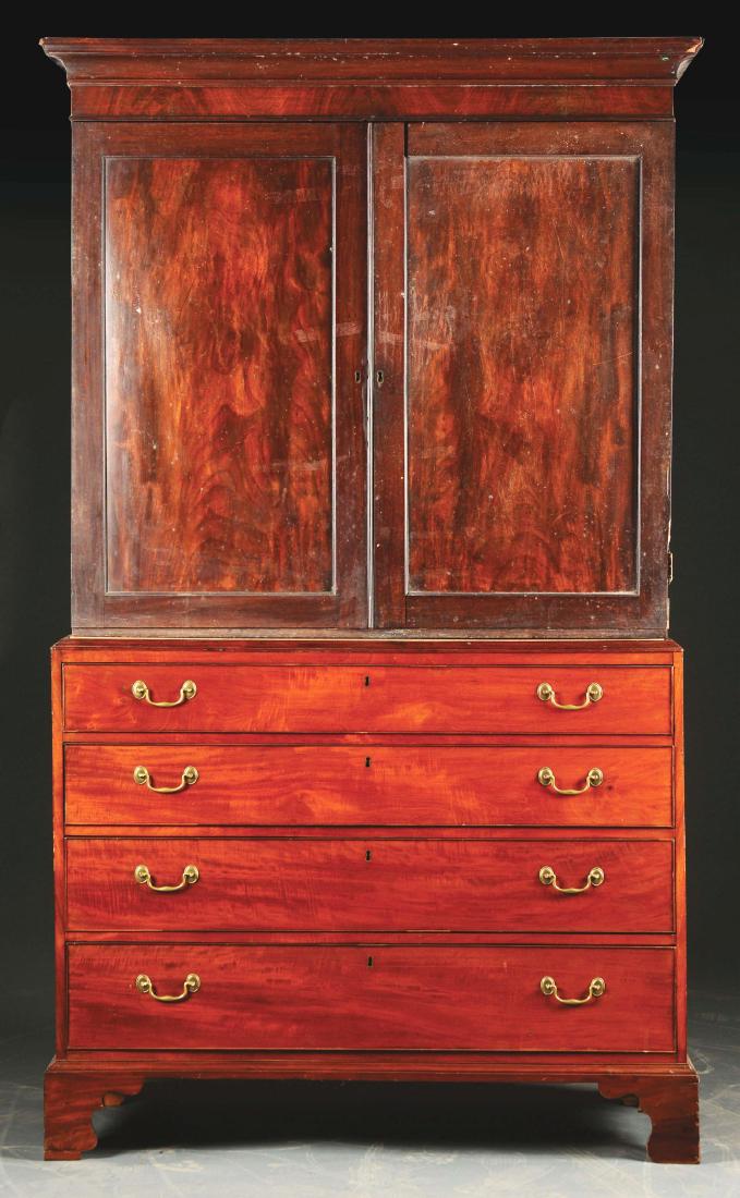Late George III Mahogany Linen Press.: Late 18th to early 19th century. England. Linen press is in two parts. The upper case is in as-found condition and has cove molded cornice over a pair of panel doors opening to an interior fitted with