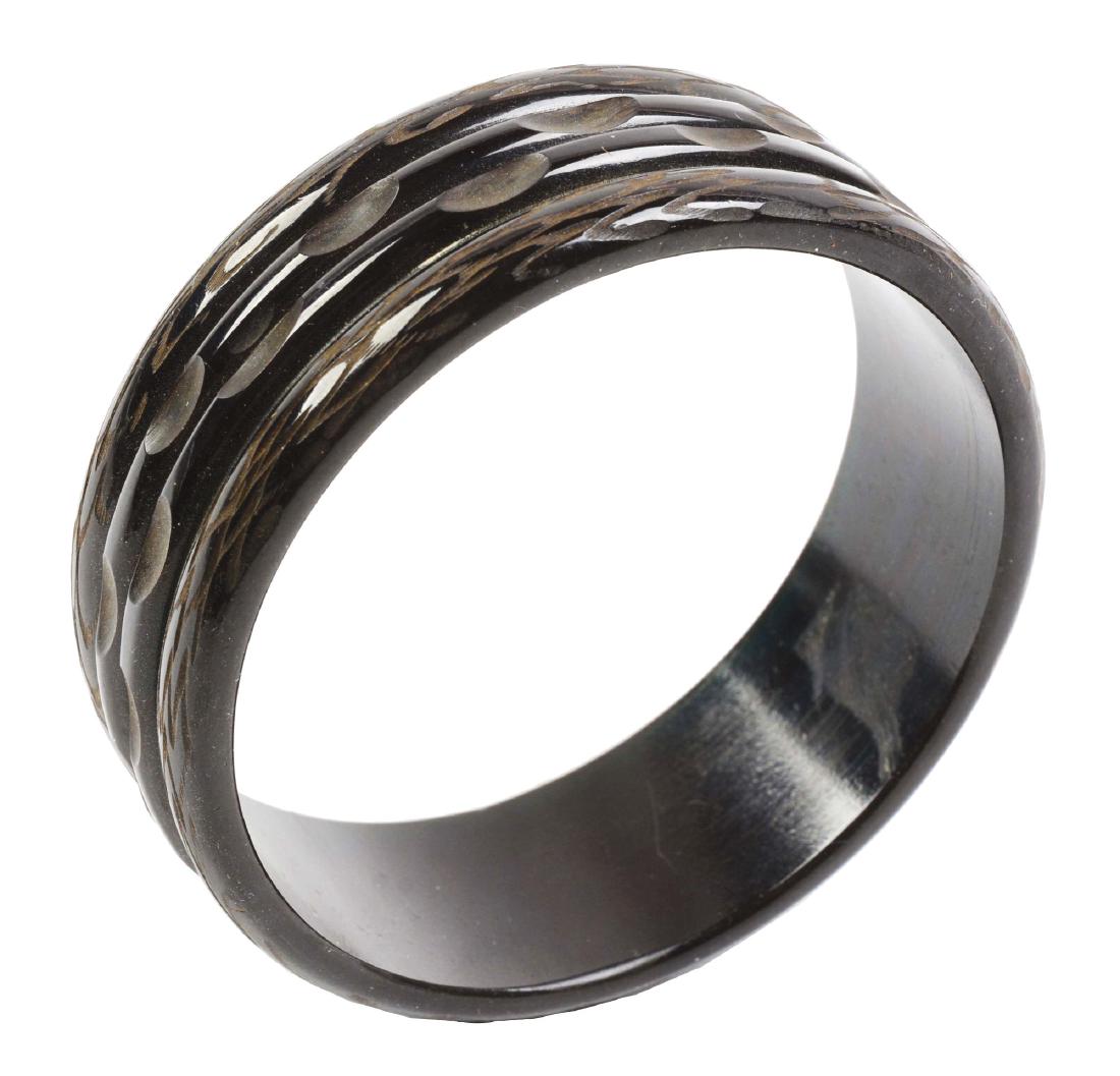 Bakelite Bracelet.: Black bakelite bracelet with unique carved design. Condition: (Excellent). Dimensions: 2 - 3/4" Dia.