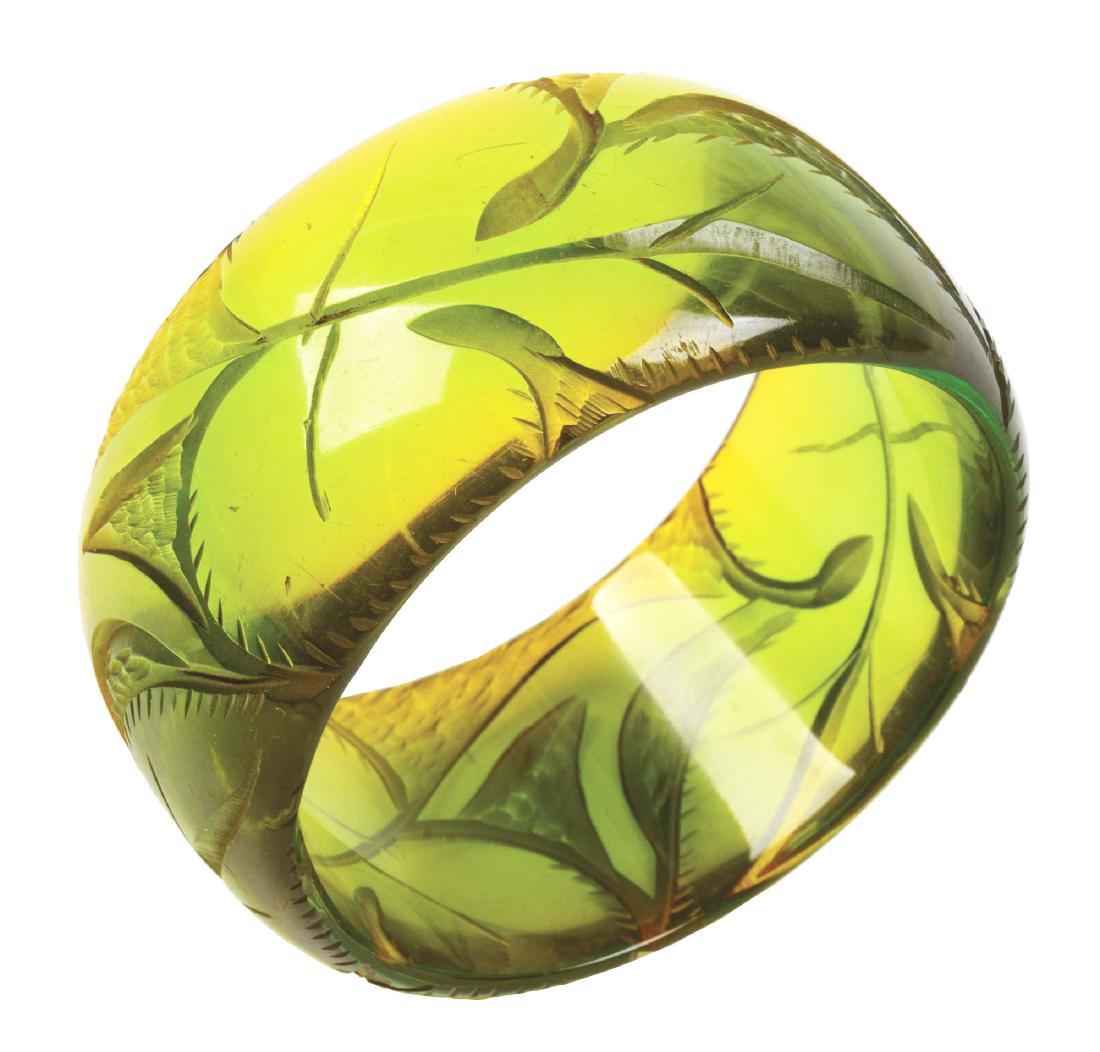 Bakelite Bracelet.: Green reverse carved bakelite bracelet with vine design. Condition: (Excellent). Dimensions: 3" Dia.